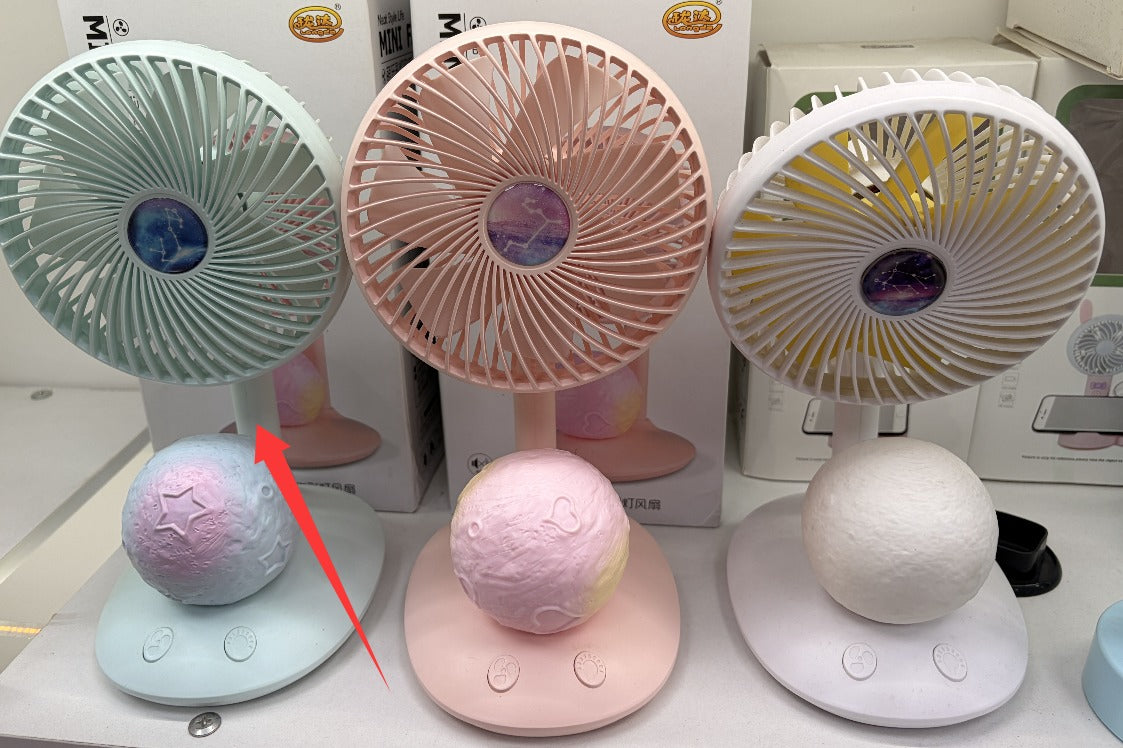 plastic fan with blue colored lights