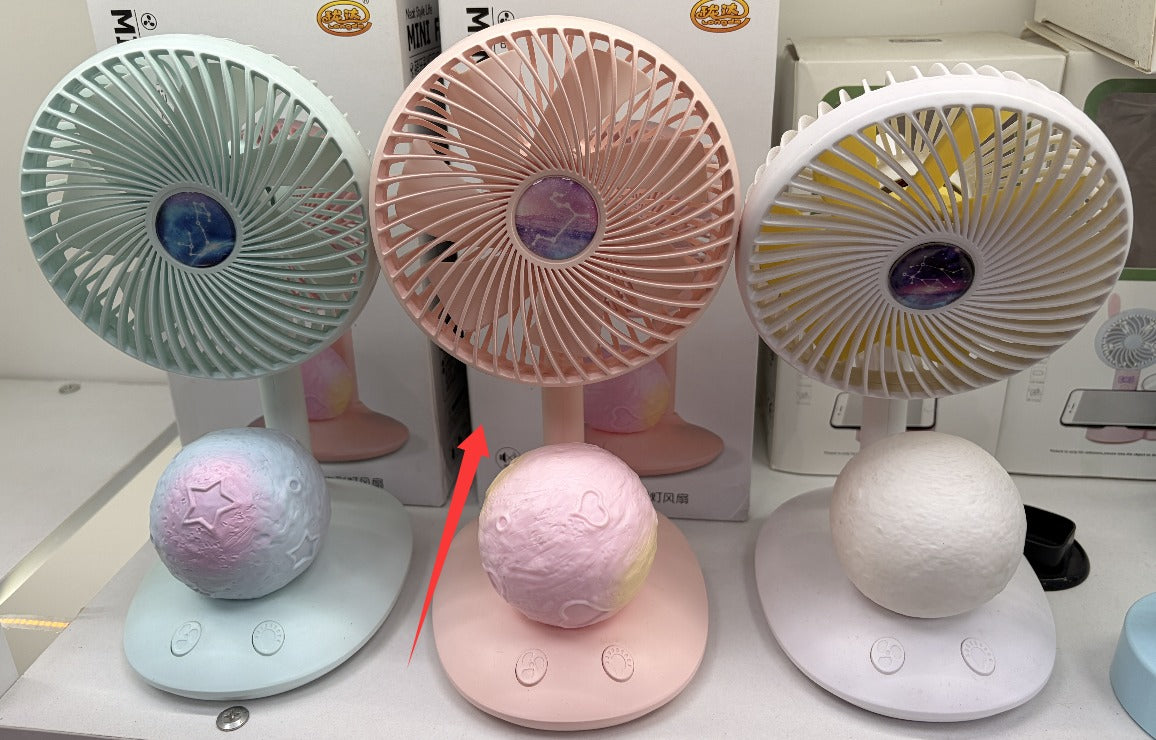 plastic fan with blue colored lights